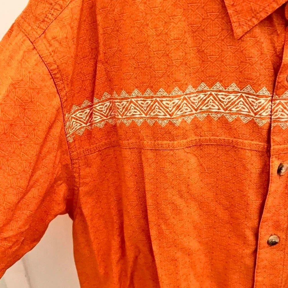 The North Face Orange button-up shirt with a boho vibe‎